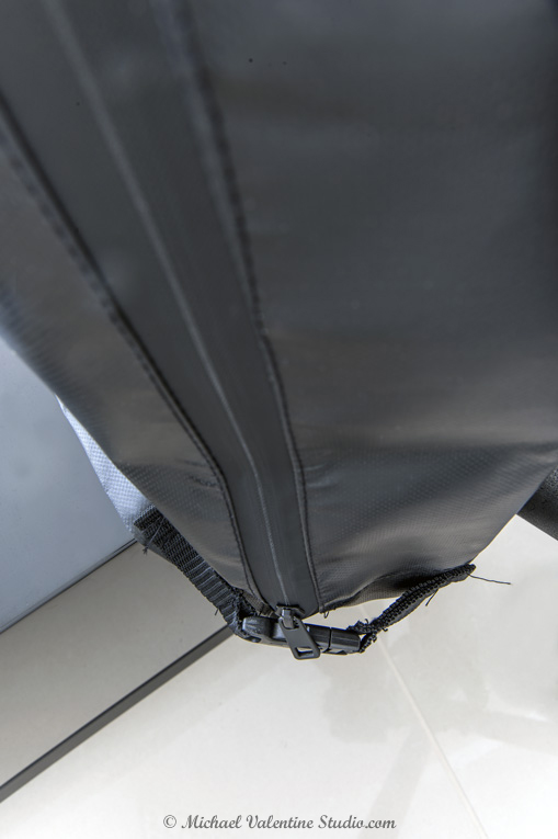 Added zip along one side for ease of fitting and removal